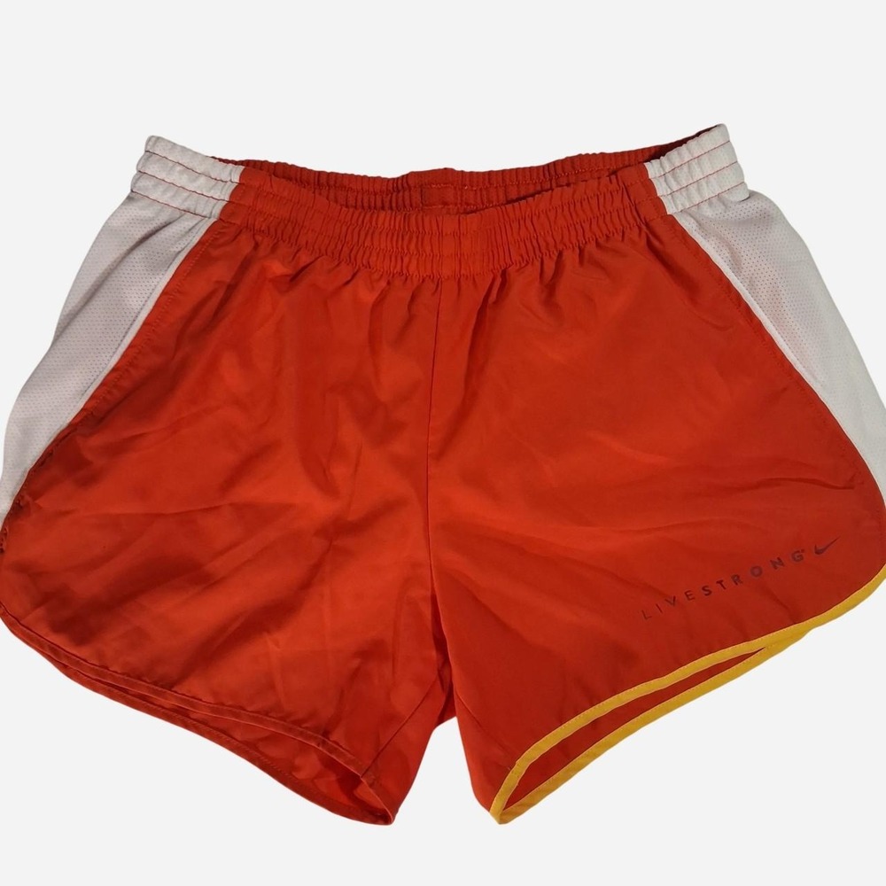 Womens Nike Dri-Fit red / orange shorts with white side panels and orange trim